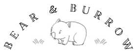 Bear and Burrow Baby logo with wombat